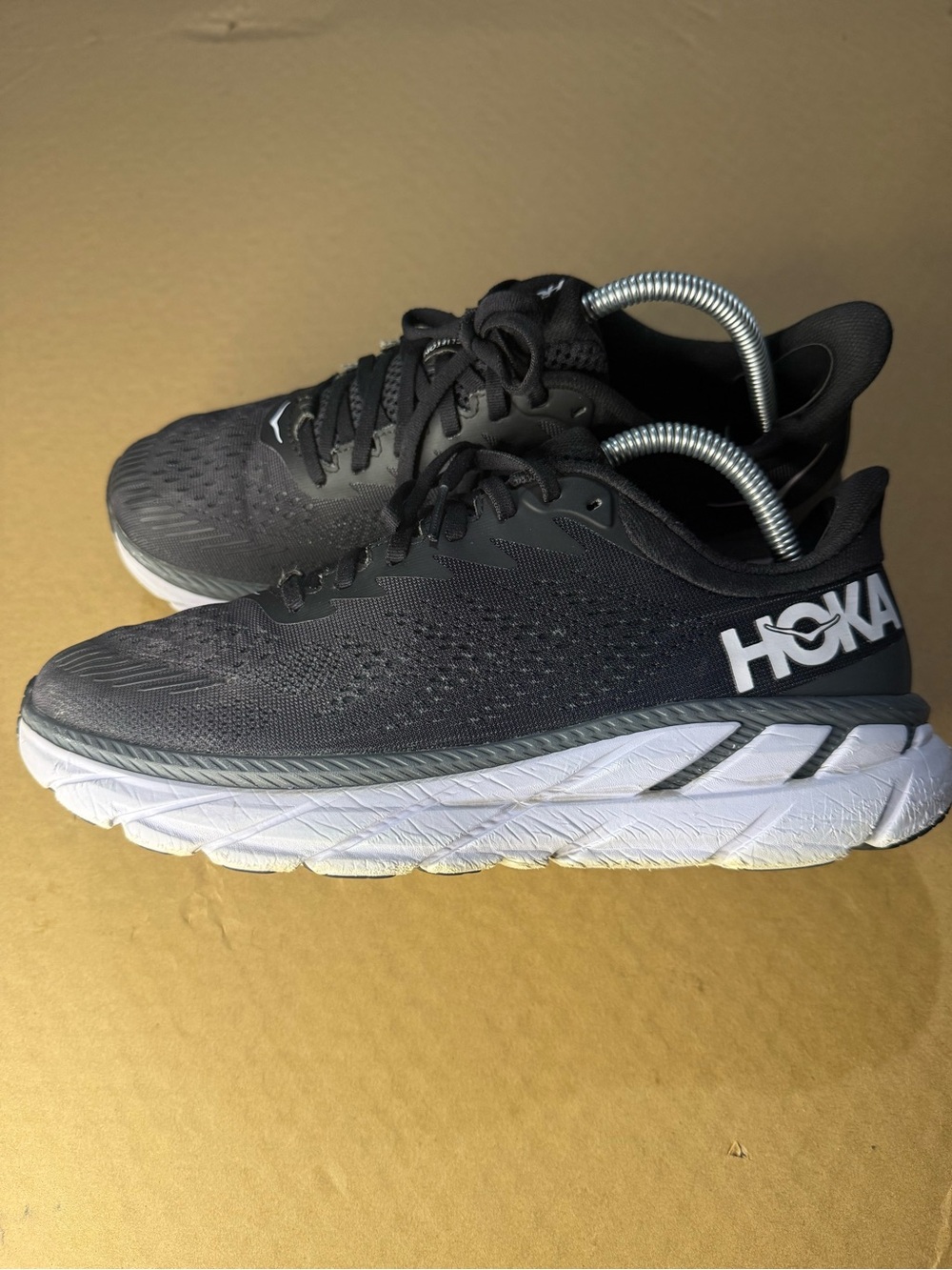 Hoka  Sneakers. Patched by the heel, good grip and size tags missing from lefty.